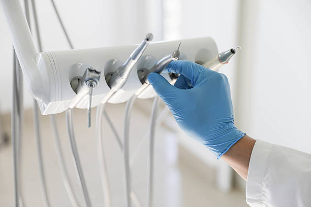 Professional Tooth Extraction technician working in Harrisville, WV